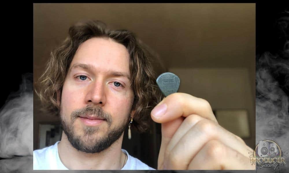 Andrew holding Dunlop Jazz III MAX Grip - Are Guitar Picks Vegan [What You Want To Know]