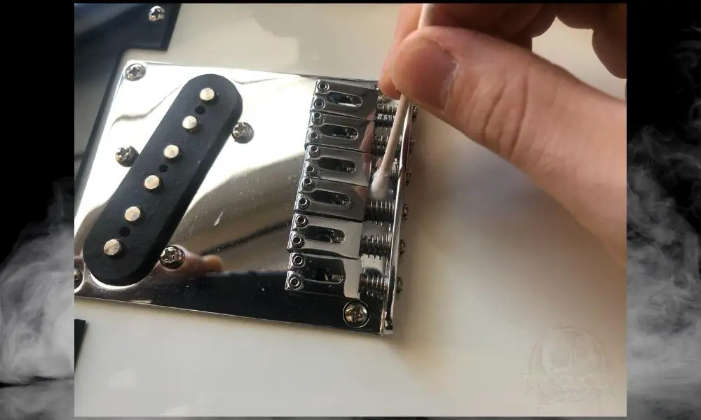 Cleaning Around the Saddles - How to Set up a Squier Telecaster