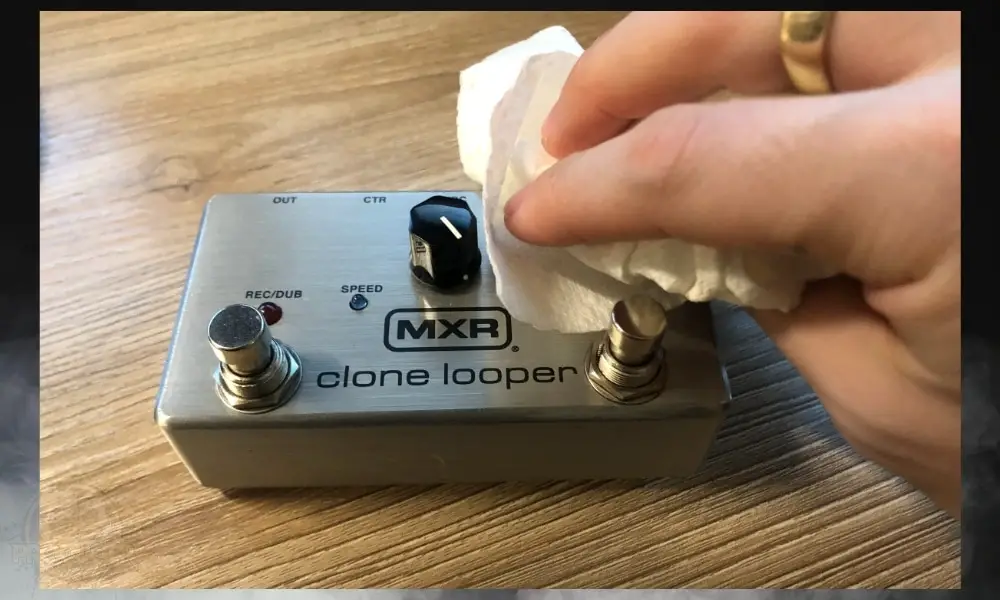 Wiping Down Pedal  - How to Fix A Wet Guitar Pedal 