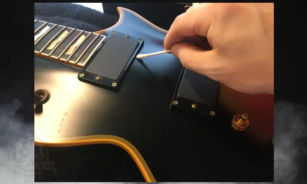 Cleaning ARound the Pickups With A Q-Tip - How To Set Up An Eclipse 